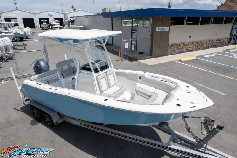Slide: The Image of 2021 Sea Fox 228 Commander boat on trailer at dealership lot. - 24