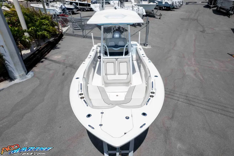 Slide: The Image of 2021 Sea Fox 228 Commander boat displayed in a marina setting. - 26