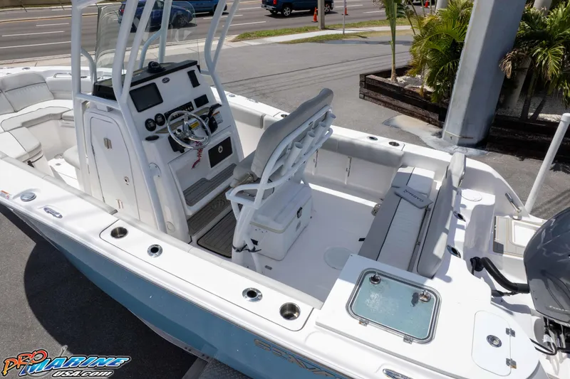 Slide: The Image of 2021 Sea Fox 228 Commander boat interior with helm, seating, and storage compartments. - 27