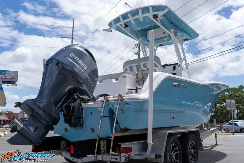Slide: The Image of 2021 Sea Fox 228 Commander boat with Yamaha engine on trailer, blue hull. - 29