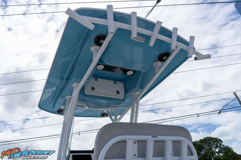 Slide: The Image of 2021 Sea Fox 228 Commander boat's T-top viewed from below against a cloudy sky. - 33
