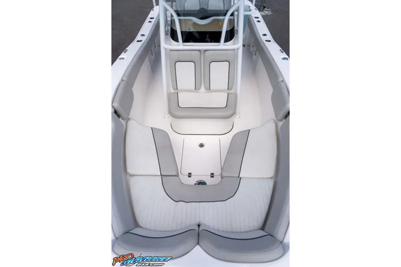 Slide: The Image of 2021 Sea Fox 228 Commander boat interior with cushioned seating and storage compartments. - 36