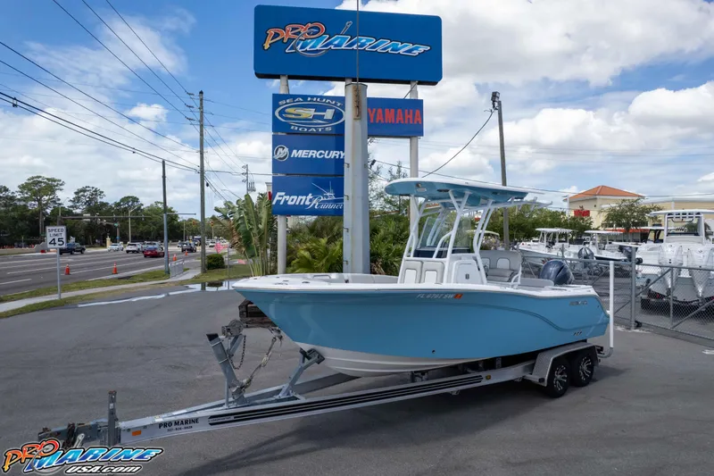 Slide: The Image of 2021 Sea Fox 228 Commander boat on trailer at Pro Marine dealership. - 38