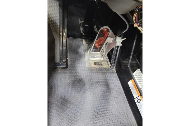 Slide: The Image of 2025 Ranger Z520R Cup-Equipped boat foot pedal with "Hot Foot" branding. - 23