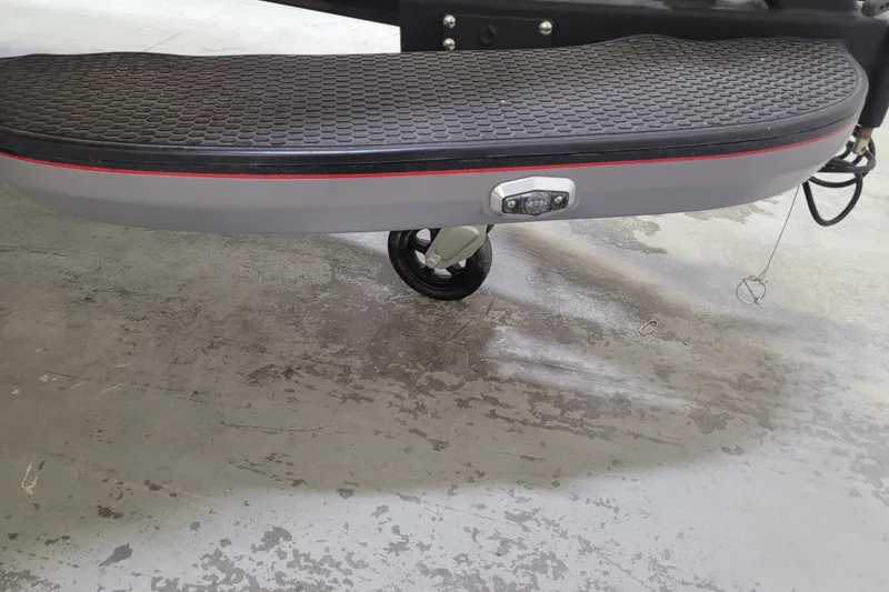 Slide: The Image of 2025 Ranger Z520R Cup-Equipped boat trailer step with textured surface and wheel. - 28