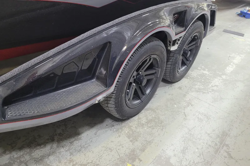 Slide: The Image of 2025 Ranger Z520R Cup-Equipped trailer with dual black wheels and sleek design. - 32