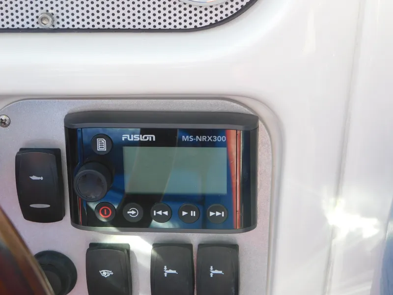 Slide: The Image of Control panel of a 2009 Chris-Craft Corsair 25 with Fusion MS-NRX300 stereo system. - 27