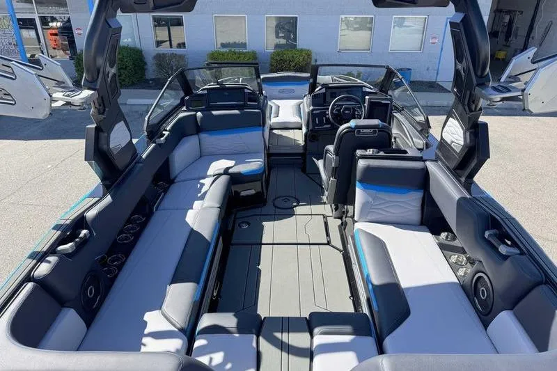 Slide: The Image of 2026 Supra SL boat interior with spacious seating and modern design. - 11
