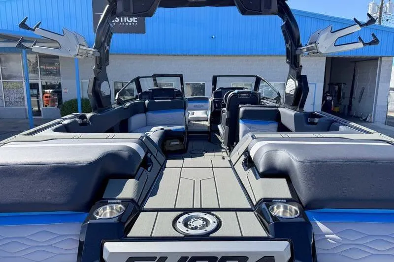 Slide: The Image of 2026 Supra SL boat interior with spacious seating and modern design. - 13