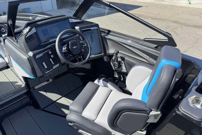 Slide: The Image of 2026 Supra SL boat cockpit with modern steering and digital controls. - 5