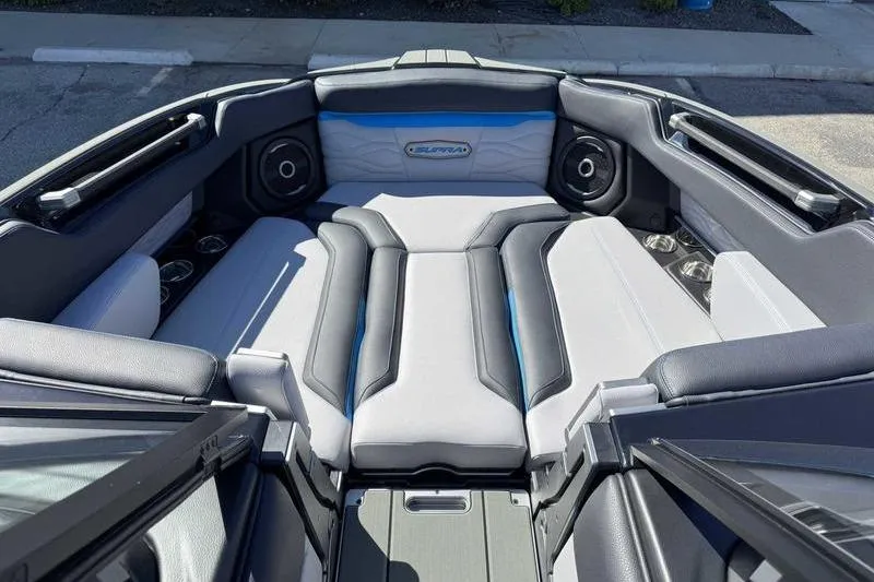 Slide: The Image of 2026 Supra SL boat interior with sleek seating and modern design. - 9