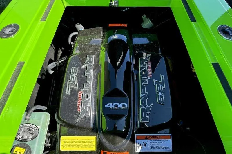 Slide: The Image of 2021 Moomba Mondo boat engine, Raptor 6.2L, green exterior. - 5