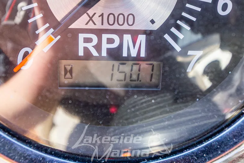 Slide: The Image of Close-up of 2017 NauticStar 193 SC RPM gauge displaying 150.7 hours. - 17