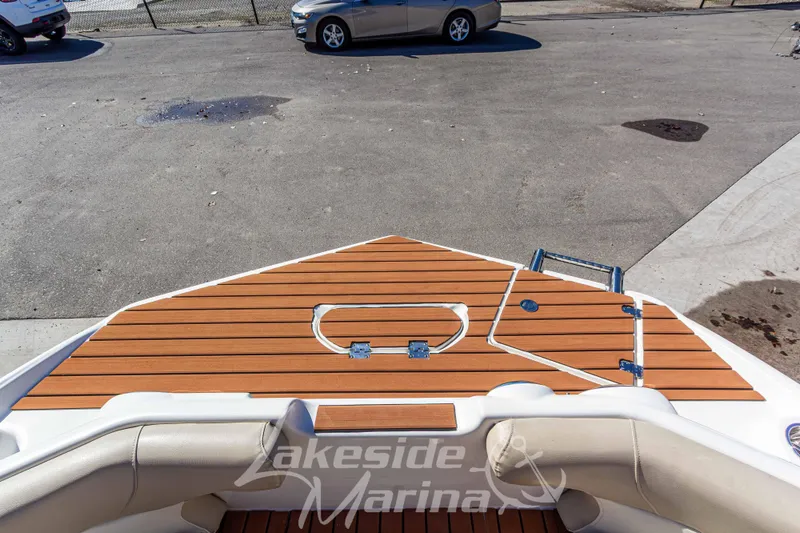 Slide: The Image of 2017 NauticStar 193 SC boat with teak deck at Lakeside Marina. - 23