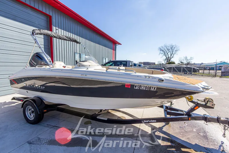Slide: The Image of 2017 NauticStar 193 SC boat on trailer at Lakeside Marina. - 8