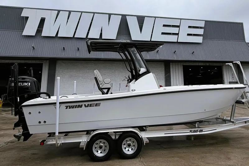 The Image of 2026 Twin Vee 22 BayCat boat on trailer outside dealership. - 0