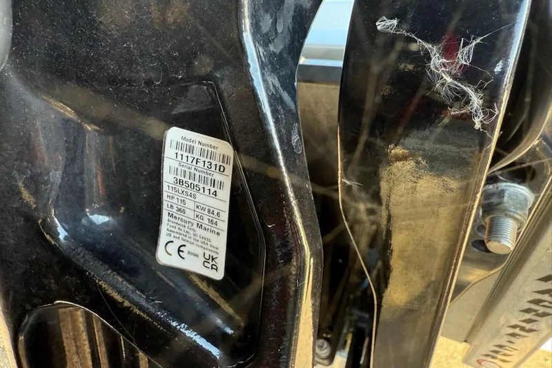 Slide: The Image of Close-up of a 2024 Mako 18 LTS boat engine label with specifications. - 2