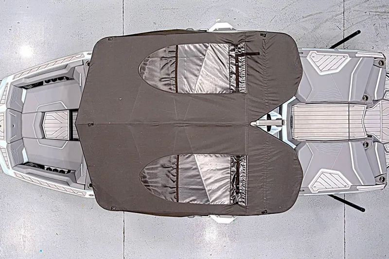Slide: The Image of 2025 Nautique Super Air Nautique G23 Paragon boat with protective cover, top view. - 6