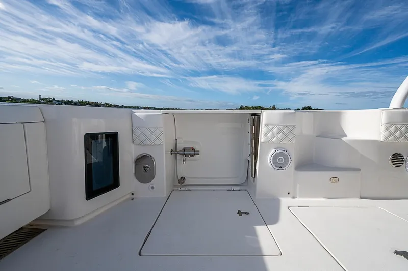 Slide: The Image of 2024 Intrepid 41 Valor yacht deck with clear sky and ocean view. - 19