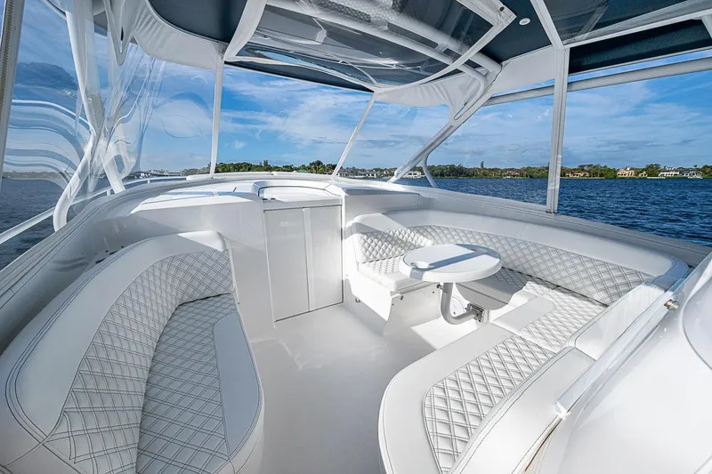 Slide: The Image of Luxurious interior of 2024 Intrepid 41 Valor yacht with elegant seating and scenic water view. - 28