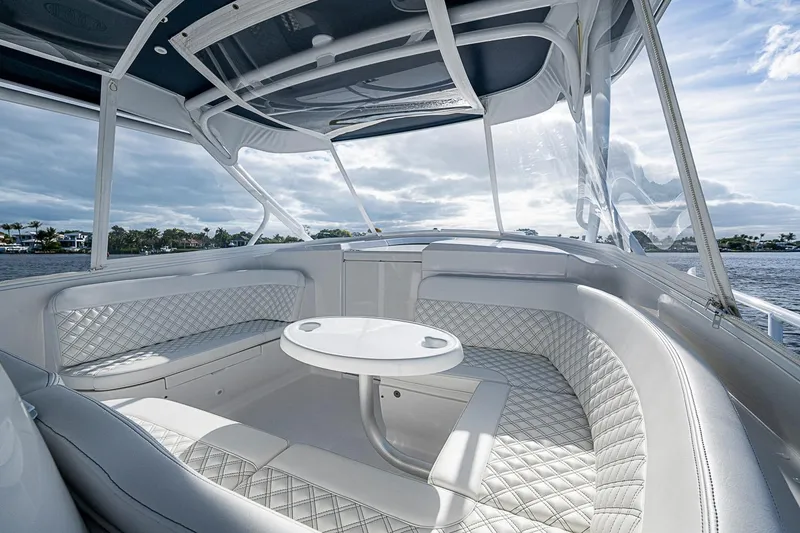 Slide: The Image of Luxurious interior of 2024 Intrepid 41 Valor boat with elegant seating and table. - 33