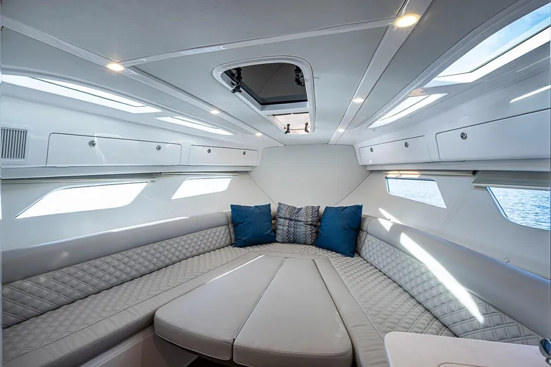 Slide: The Image of Luxurious interior of 2024 Intrepid 41 Valor yacht with plush seating and elegant design. - 41