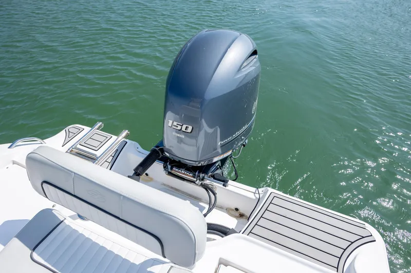 Slide: The Image of 2020 Sea Fox 206 Commander boat with Yamaha 150 outboard motor on water. - 21