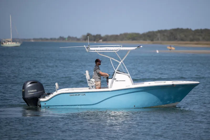 Slide: The Image of 2020 Sea Fox 206 Commander boat cruising on calm waters with Yamaha engine. - 6