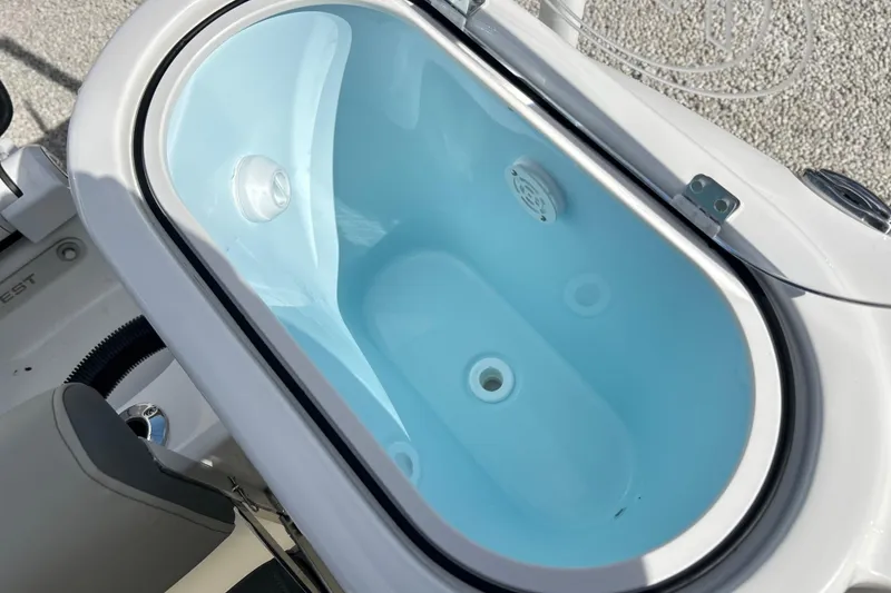 Slide: The Image of Livewell on 2026 Key West 260 Center Console boat, featuring a sleek design. - 23