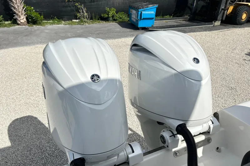 Slide: The Image of Twin Yamaha outboard engines on a 2026 Key West 260 Center Console boat. - 30