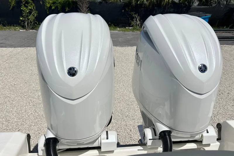 Slide: The Image of Twin Yamaha outboard engines on a 2026 Key West 260 Center Console boat. - 46