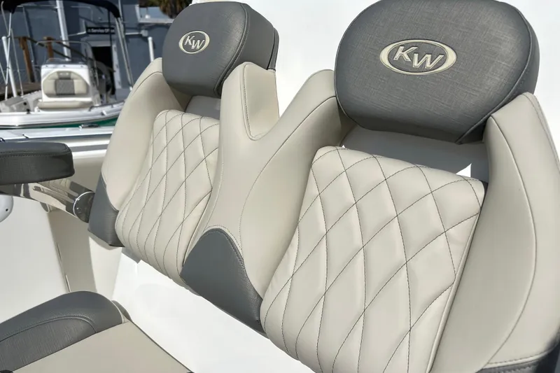 Slide: The Image of Luxurious seating on 2026 Key West 260 Center Console boat, featuring elegant diamond stitching. - 8