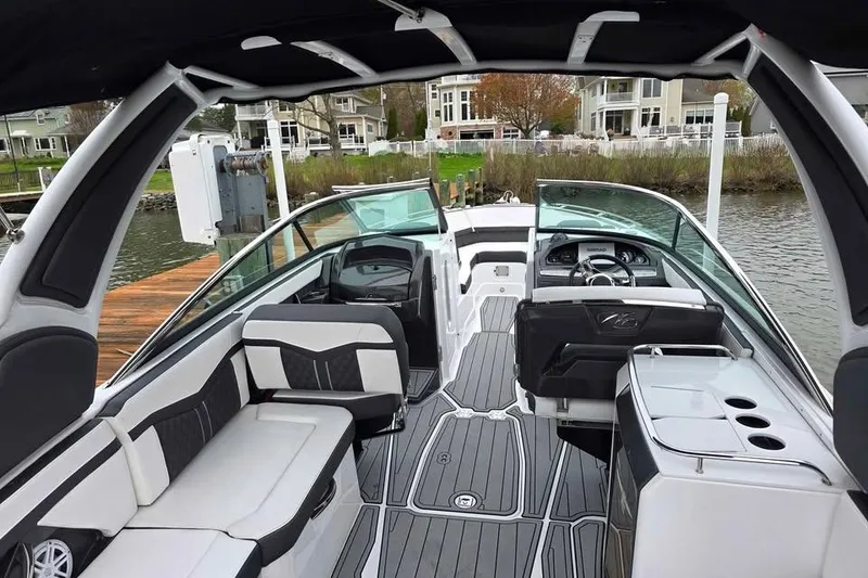 Slide: The Image of 2024 Monterey 275SS Super Sport boat interior with sleek seating and modern dashboard. - 4