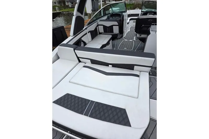 Slide: The Image of 2024 Monterey 275SS Super Sport boat interior with sleek seating and modern design. - 6