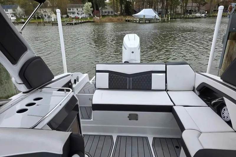 Slide: The Image of 2024 Monterey 275SS Super Sport boat interior with sleek seating and modern design. - 8