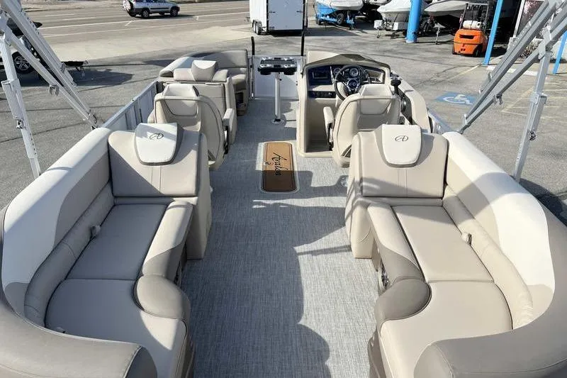 Slide: The Image of 2023 Avalon 2385 25 LSZ QL pontoon boat with spacious seating and modern interior design. - 1