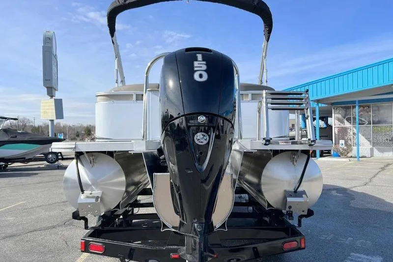 Slide: The Image of 2023 Avalon 2385 25 LSZ QL pontoon boat with 150 HP engine, rear view. - 12