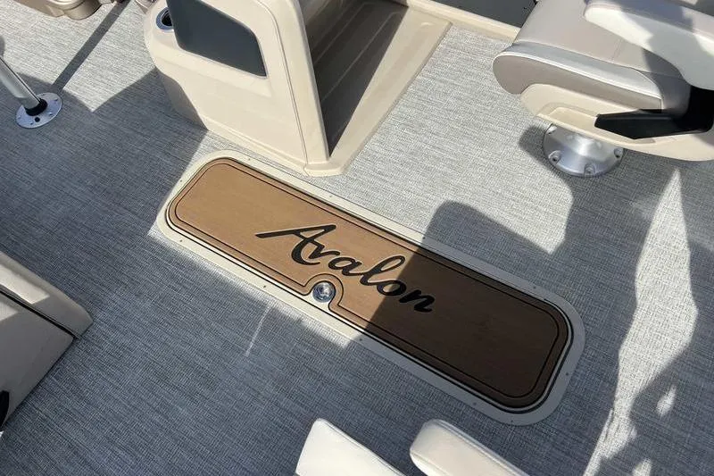 Slide: The Image of 2023 Avalon 2385 25 LSZ QL boat interior with branded flooring detail. - 9