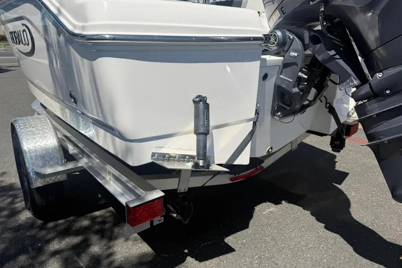 Slide: The Image of 2025 Robalo R180 Center Console boat on trailer, rear view with motor. - 10