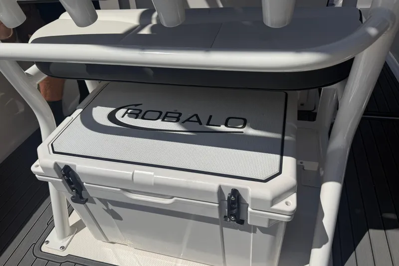 Slide: The Image of 2025 Robalo R180 Center Console boat with integrated storage compartment. - 34