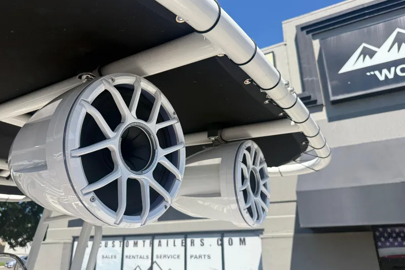 Slide: The Image of Speakers mounted on a 2025 Robalo R180 Center Console boat, showcasing marine audio equipment. - 35