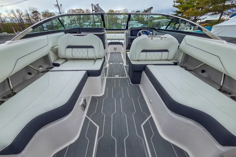 Slide: The Image of Luxurious interior of 2025 Regal LX4 boat with spacious seating and modern design. - 17