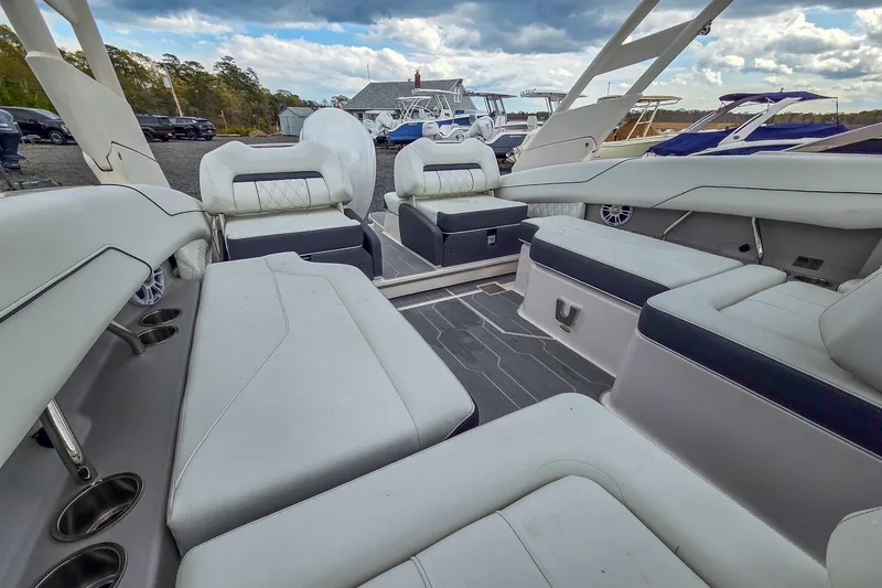 Slide: The Image of Luxurious interior of 2025 Regal LX4 boat with spacious seating and modern design. - 18