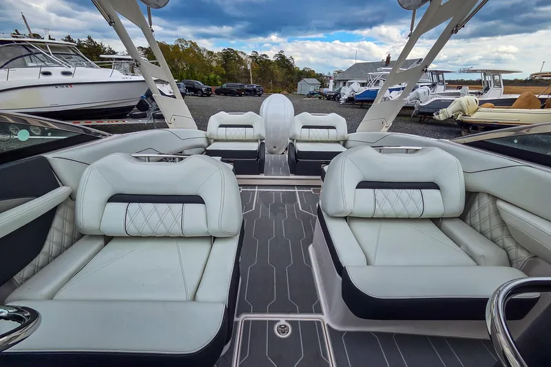 Slide: The Image of Luxurious interior of 2025 Regal LX4 boat with plush seating and modern design. - 27