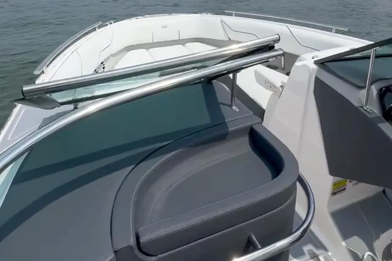 Slide: The Image of 2025 Regal LX4 boat on trailer, featuring Yamaha outboard motor, parked outdoors. - 6