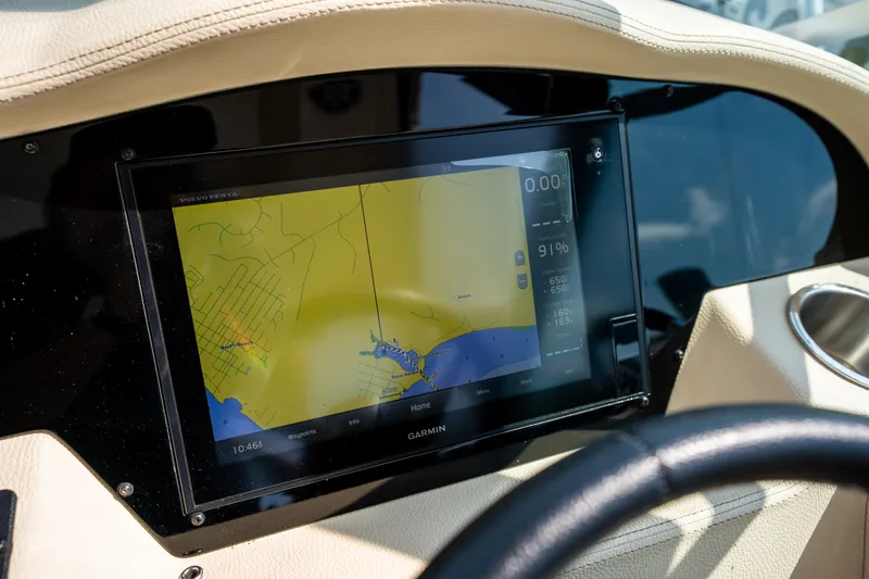 Slide: The Image of The image shows a navigation system on a 2019 Regal 33 Express boat. - 20