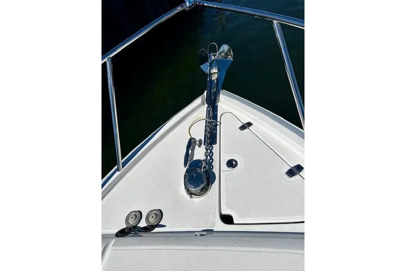 Slide: The Image of Bow of 2022 Regal 26 XO boat with anchor and chain mechanism. - 18