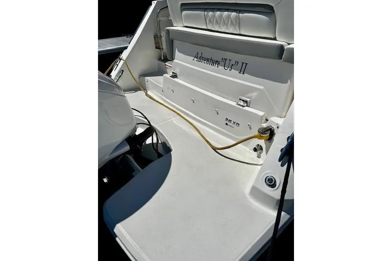 Slide: The Image of 2022 Regal 26 XO boat deck with seating and power connection. - 23