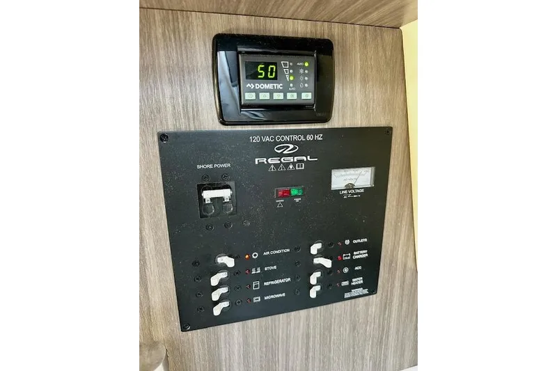 Slide: The Image of Control panel of a 2022 Regal 26 XO boat with Dometic display. - 25