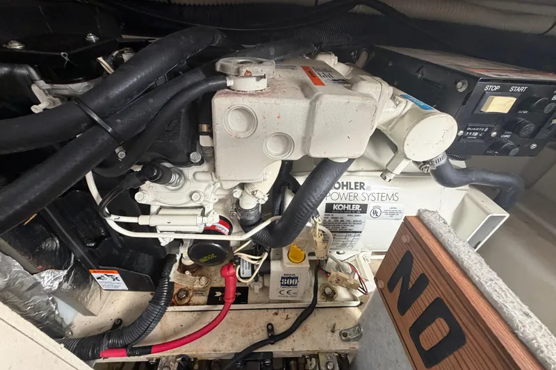 Slide: The Image of Engine compartment of a 2005 Sea Ray Sundancer 280 with Kohler power systems. - 34